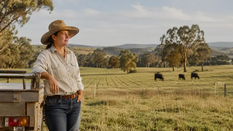 Australian farmer surveying a mixed farming property